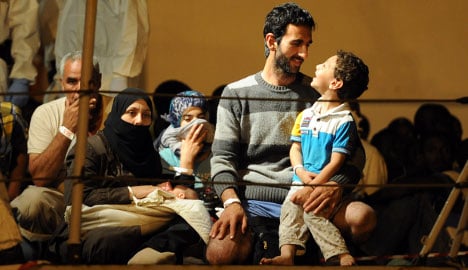Migrants in Pozzallo, Sicily, in July 2014. Photo: Giovanni Isolino/AFP